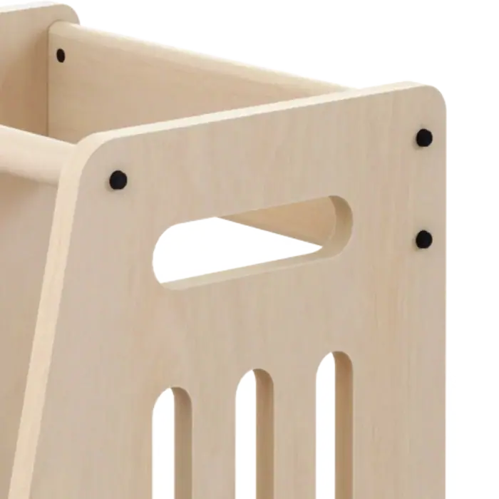 Close-up of the cut-out handle at the top of the side panel